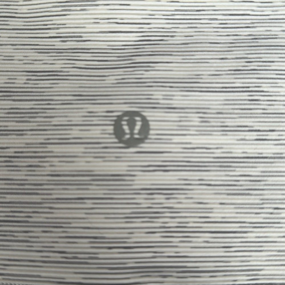 these are white/grayish lululemon capri leggings in a size 10.
